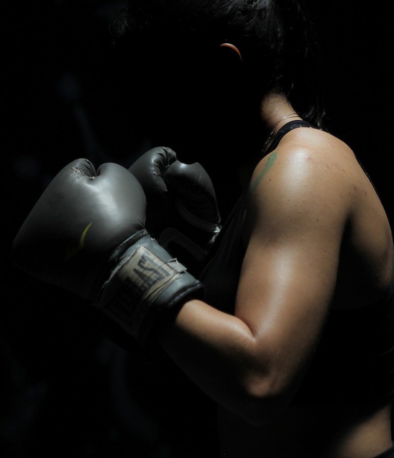 Photo of Woman in Boxing Gloves<br />
