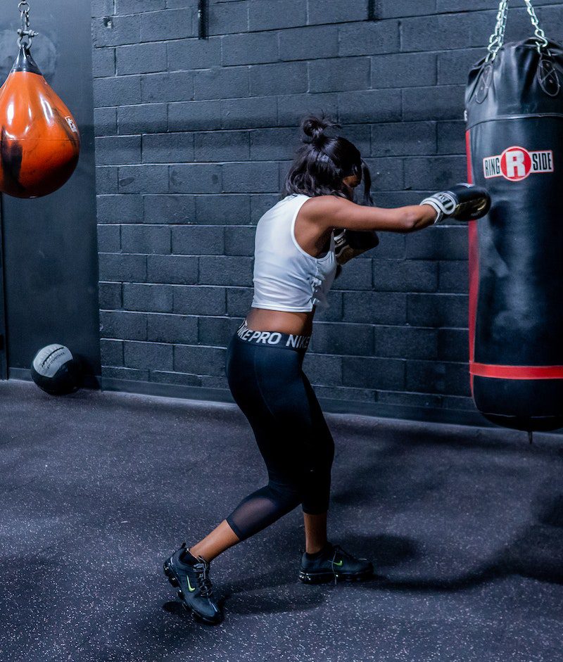 A Woman Hitting the Punching Bag<br />
